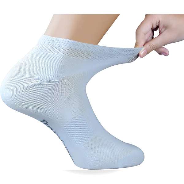 Hand pulling up light blue ankle sock with seamless toe and elastic top showing snug breathable fit