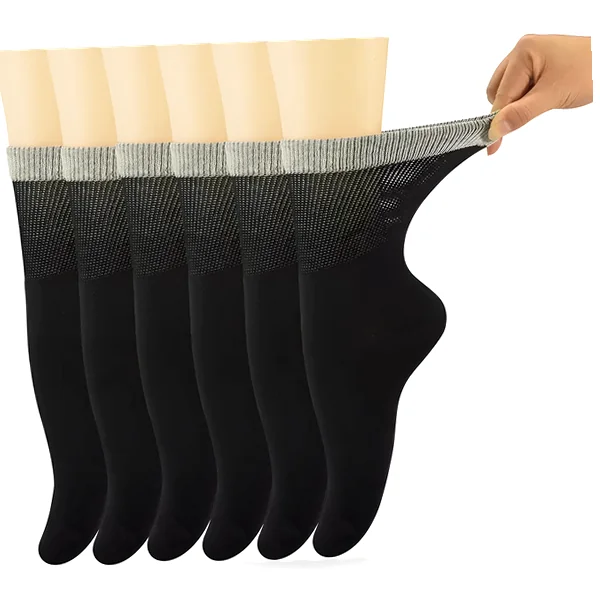 Six pairs of women's crew socks in neutral tones with seamless toes and cushioned soles